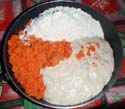 after the 1st rising, combine the rest of the flour, carrot pulp, oil, salt and raisins