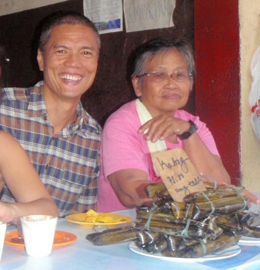 with Manang Pina at her Painitan stall in Dumaguete Market. She makes the best Budbud Kabog!