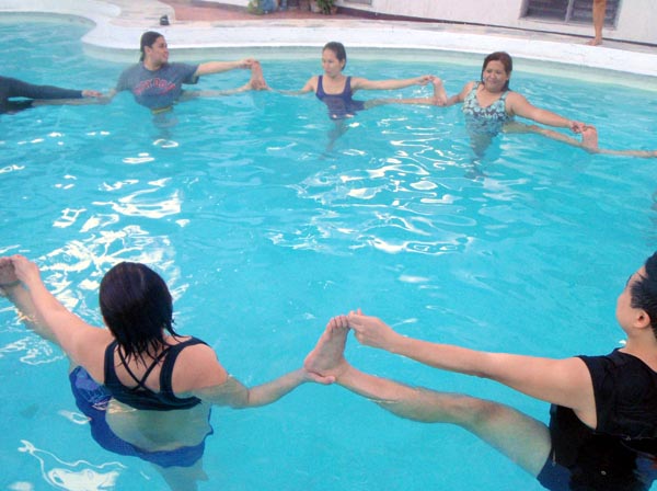 Aqua Yoga with Jeanne Torrefranca at Dragonfly Pool