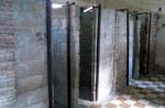 rooms were subdivided into mini torture chambers