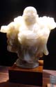 a quartz fat Buddha. Is he the Chinese version of Gautama? or a different guy altogether?