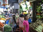 Tuyen amused at the Dumaguete Market scene