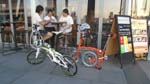 folding bike riders chilling it out at a cafe within the Marina area