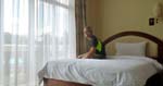 my plush hotel room at Classy Hotel