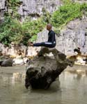 doing a few yoga asanas by the big rock