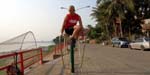 using street exercise equipment on the Mekong promenade
