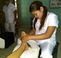 after applying the scrub and rinse, reflexology foot massage was administered