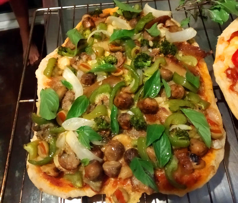 homemade dough/sauce, mozzarella cheese, grilled eggplant/garlic, fresh basil/mushroom and Thai Northern sausage