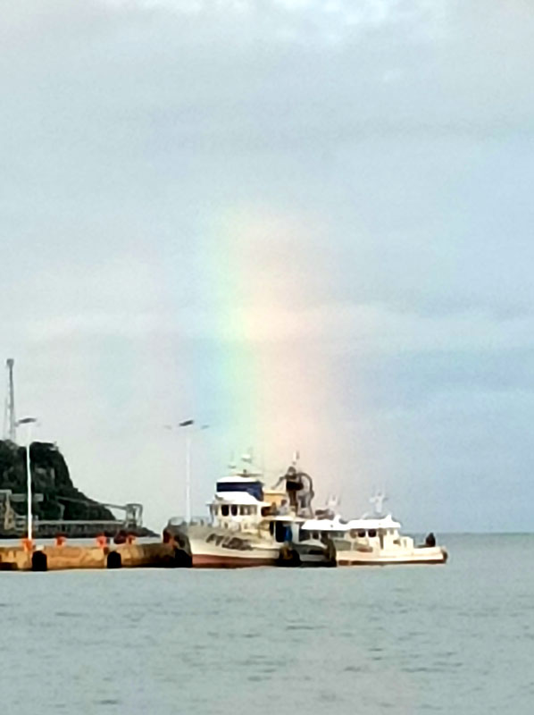 Rainbow over a Boat